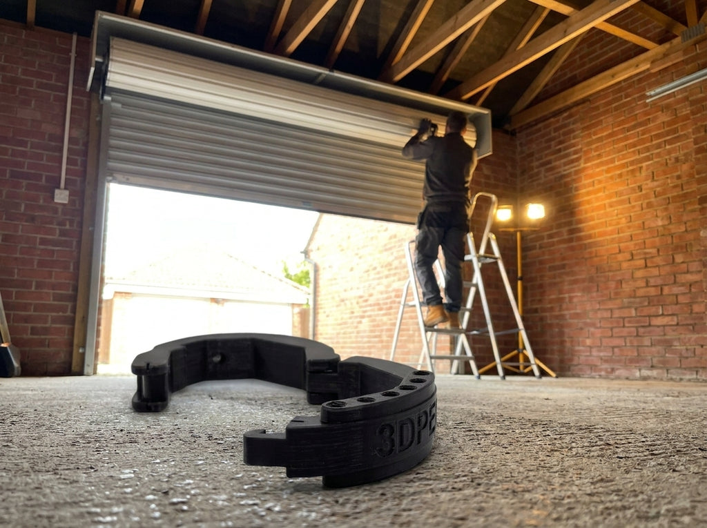 Collar shown with a roller garage door barrel mechanism